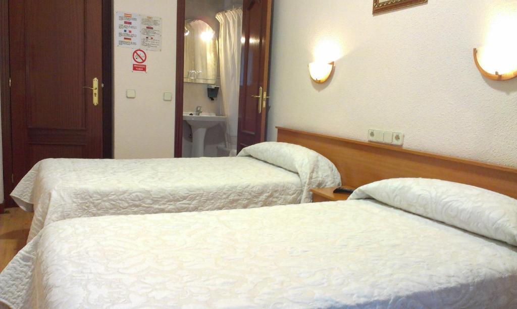 Quarto com 2 Camas de Solteiro